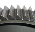 Gear with asymmetric teeth